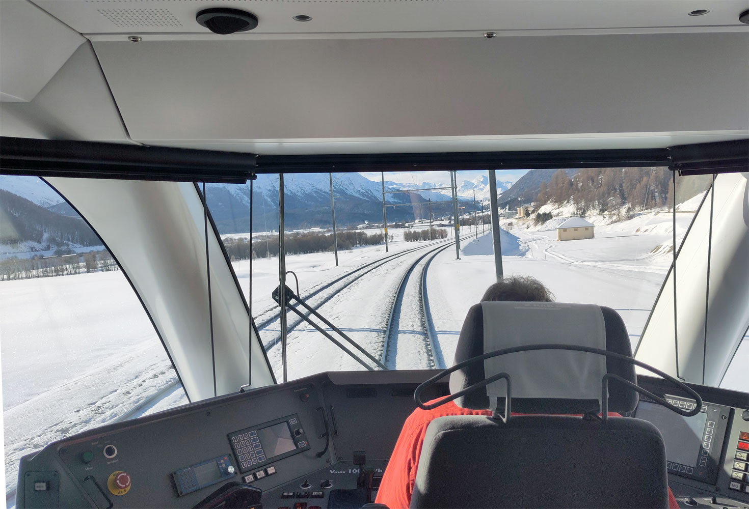 View through the driver's front windshield from the 1st class cabin of the RhB Stadler Allegra train